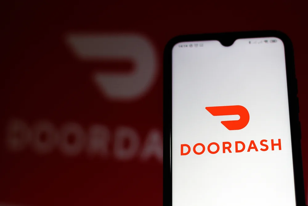 DoorDash app context for iPhone system location modification